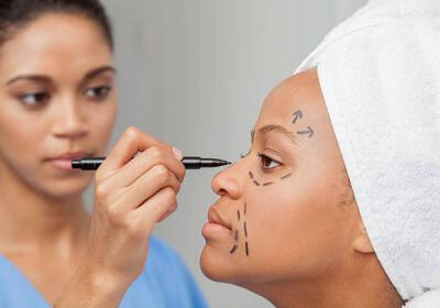 Plastic surgeon reviewing reconstructive surgery plans in Tshwane/Polokwane.